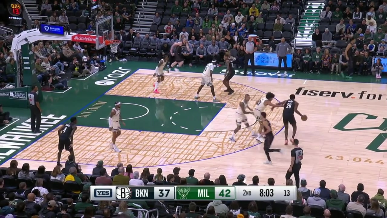 The rookie Danny Wolf dunks over Kyle Kumza for the And-1 with replays Nets and Bucks commentaries