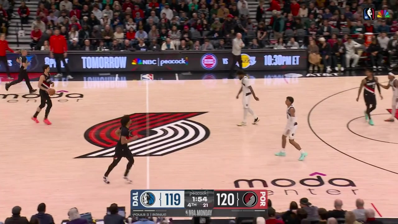 Deni Avdija drives towards the rim in crunch time and receives a late whistle that leaves the Mavericks players stunned with a replayNasji Marshall was called for the foul