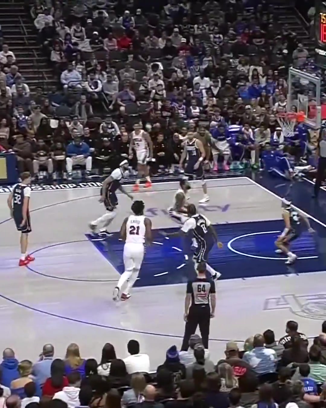 Sixers players get hyped as Paul George goes up for the dunk