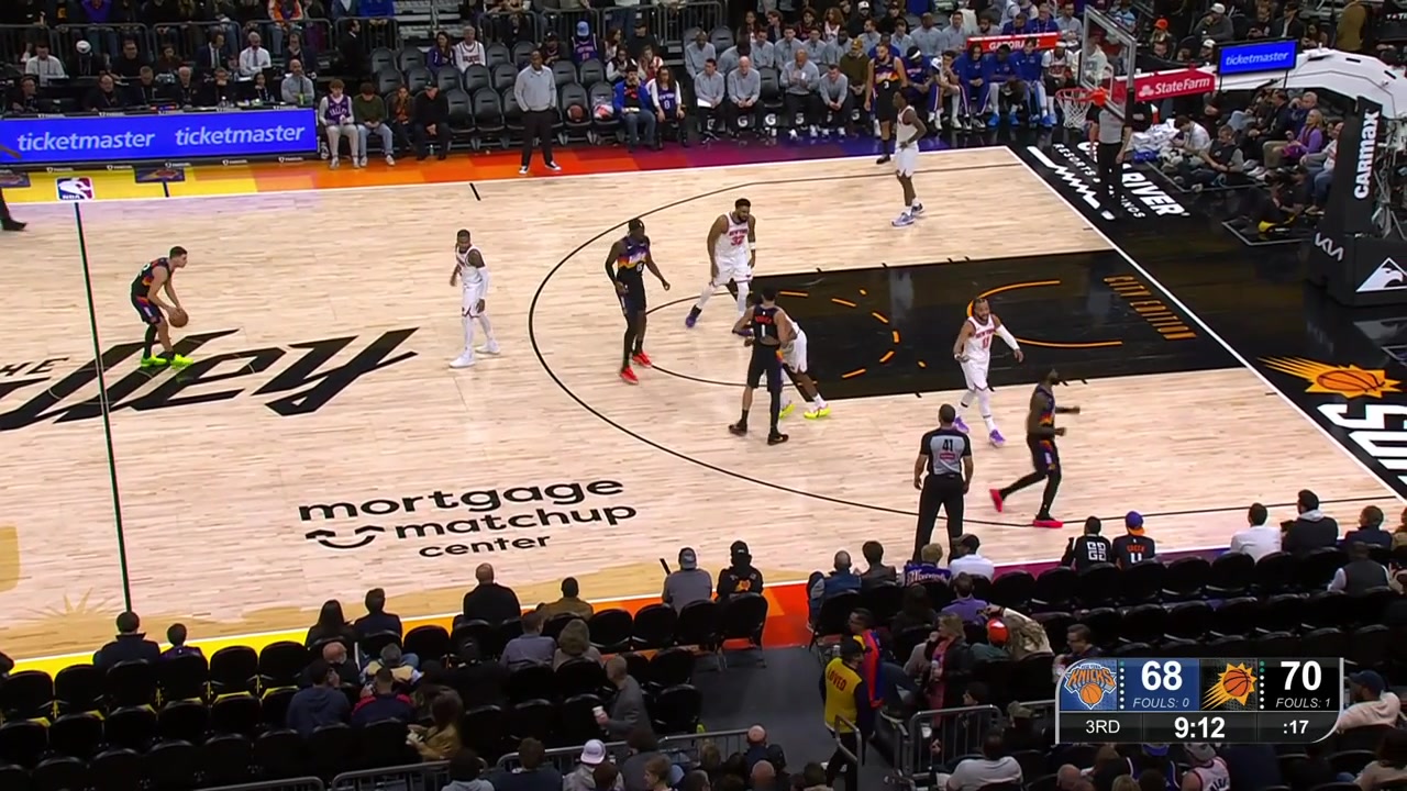 Devin Booker splits the defenders and finishes with the two-handed dunk over OG Anunoby with replays