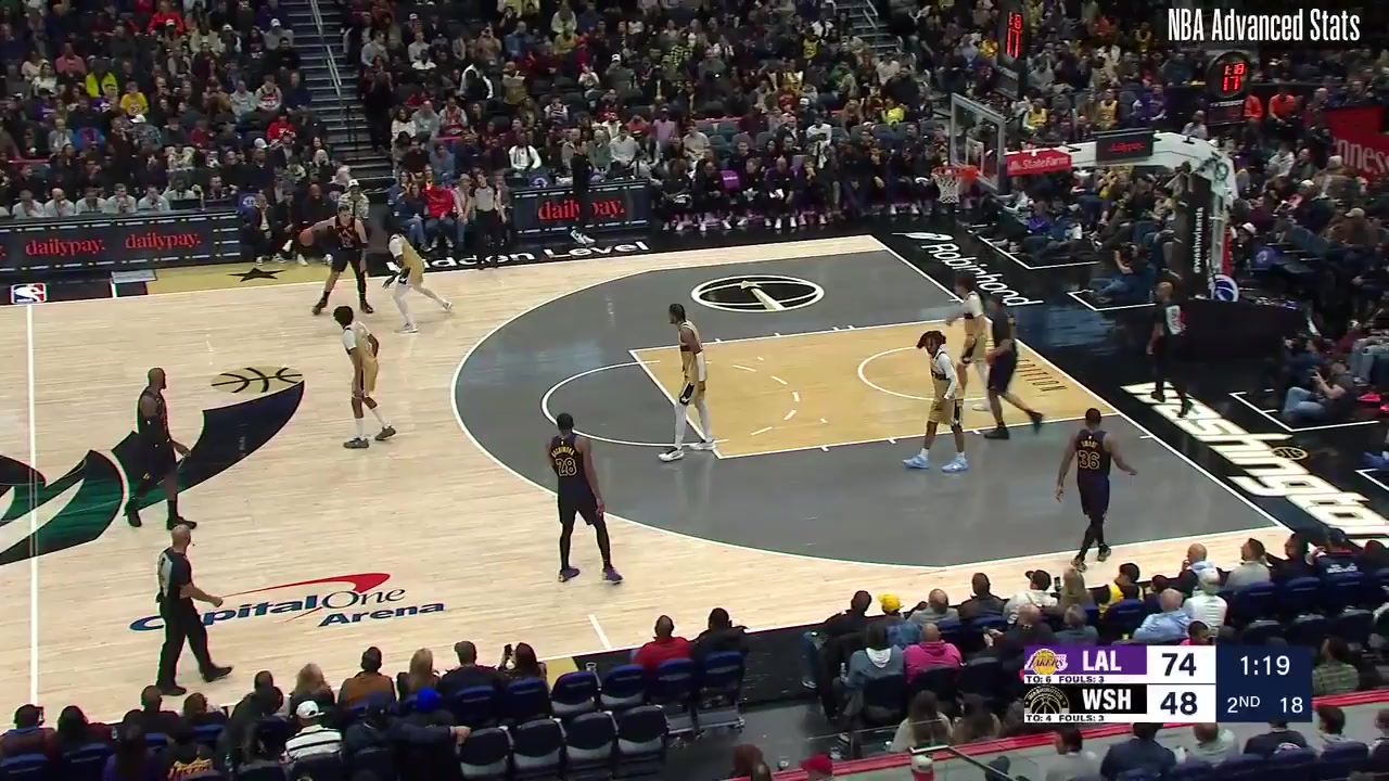 Luka Doncic banks in the 3