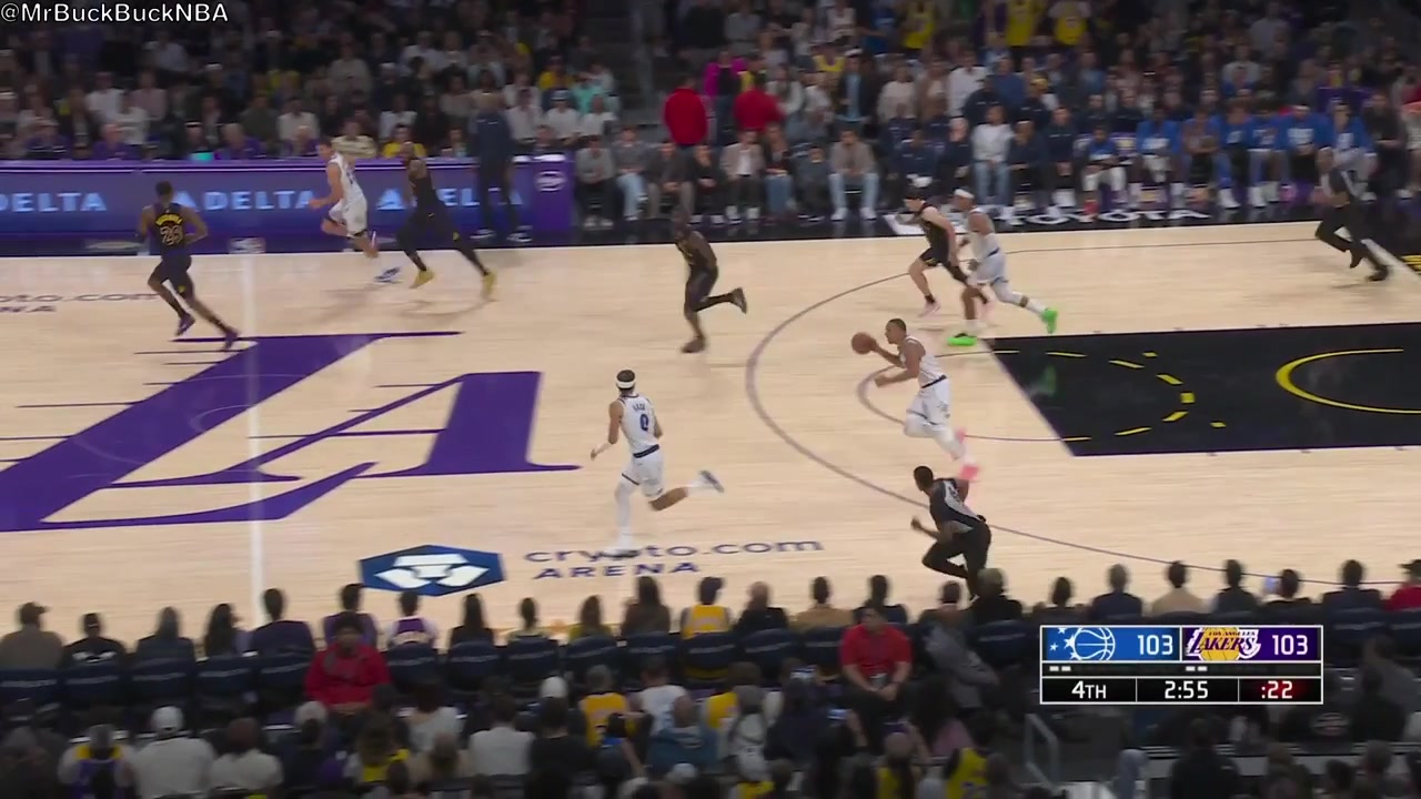 Luka Doncic hustling for the ball jumping over the first row and falling with replays Lakers and Magic commentaries