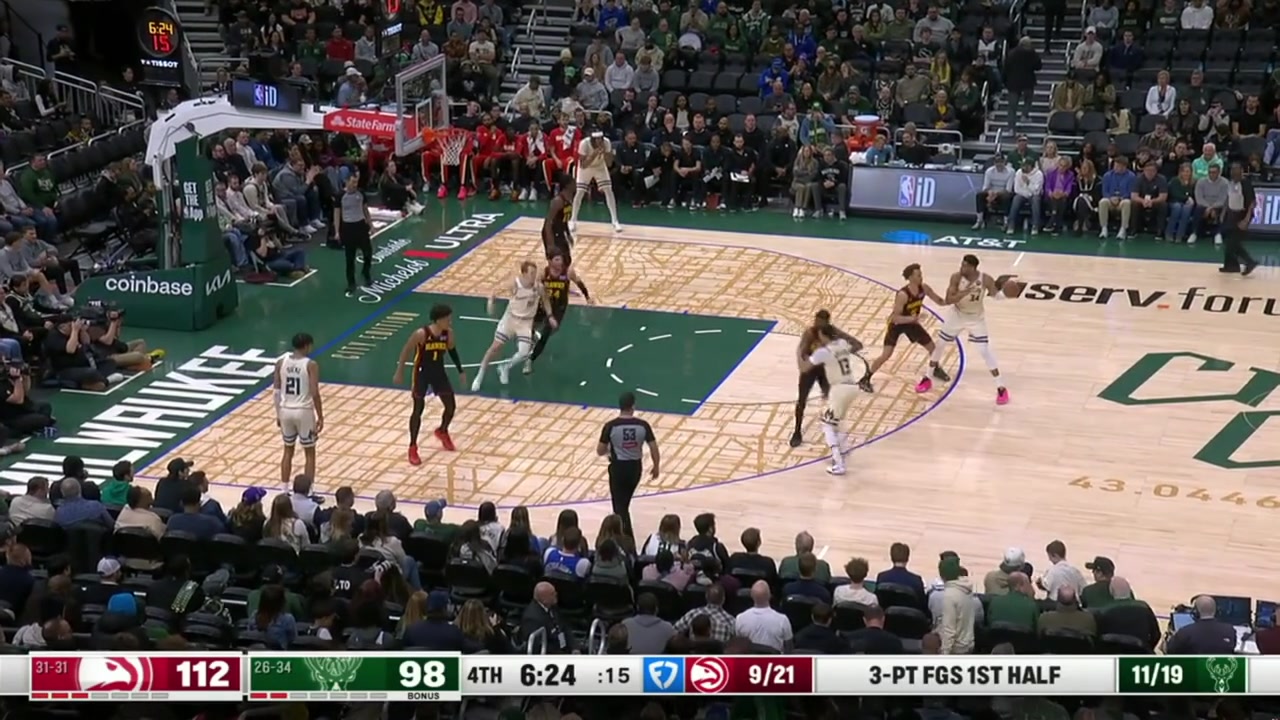 Giannis Antetokounmpo with the lefty poster dunk all over Onyeka Okongwu with replays BucksHawksESPN commentaries