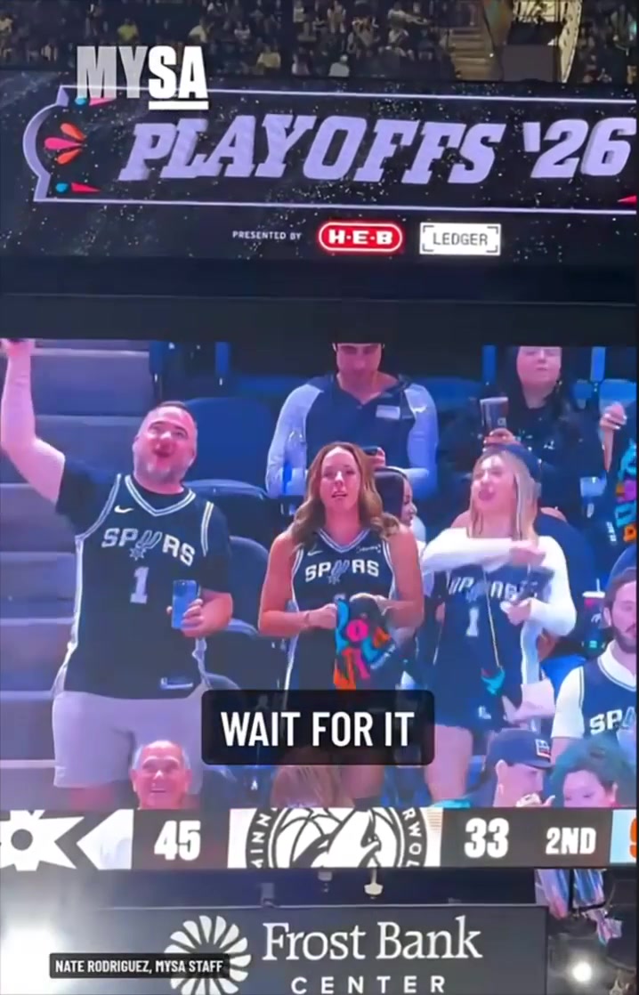 Two Spurs fans re-enact Wemby's elbow on the jumbotron during Game 5