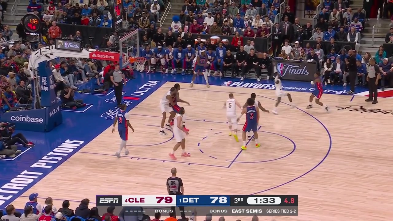 The ball gets stuck behind the backboard and the arena worker uses the broom to release it and unintentionally SCORES on his first try
