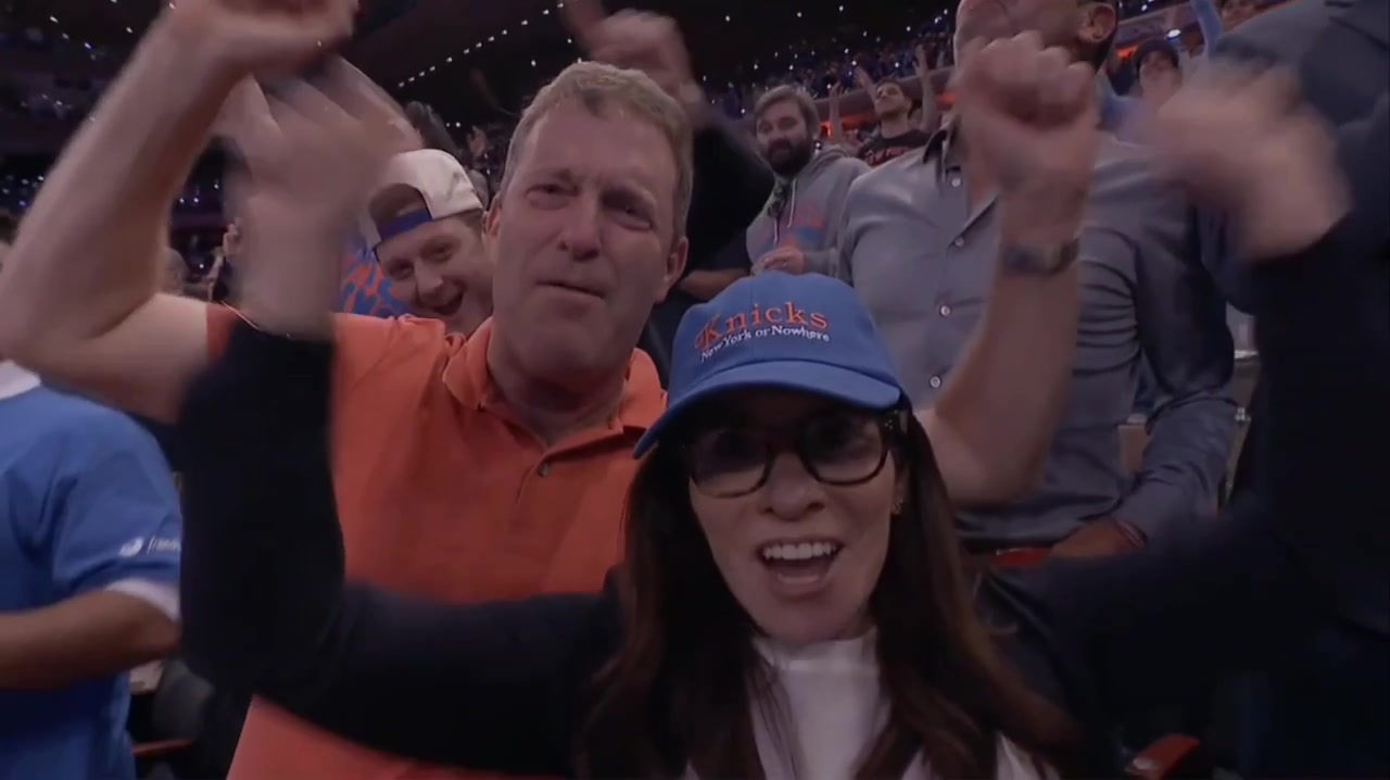 While celebrating a late comeback against the Cavaliers in game 1 a Knicks fan is hit in the face by what seems to be errant shot from a t-shirt cannon