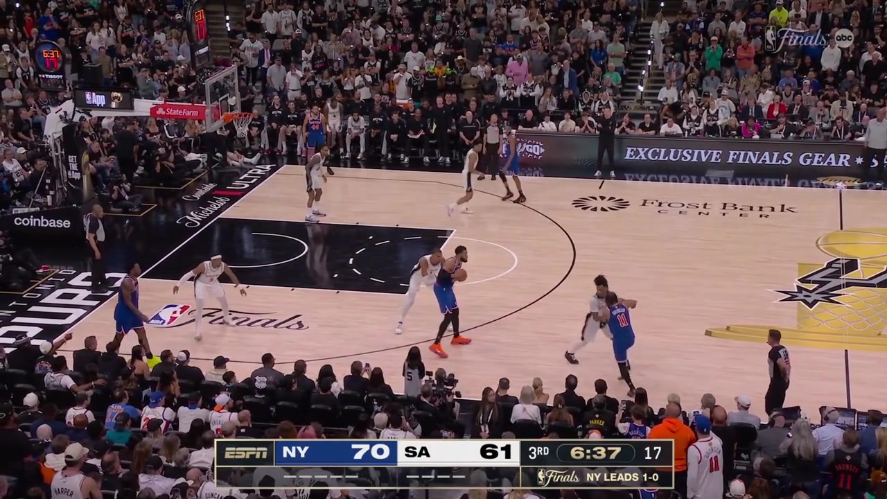 Karl-Anthony Towns uses his strength for the driving layup giving him 21 points in the game