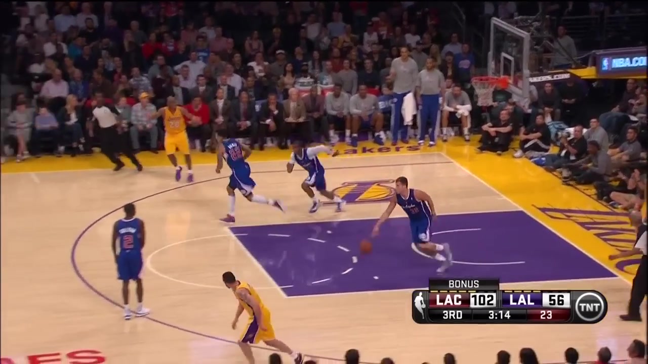 Blake Griffin throws down a nasty alley oop dunk to put the Clippers up 48 points The camera pans to a disgusted Mitch Kupchak