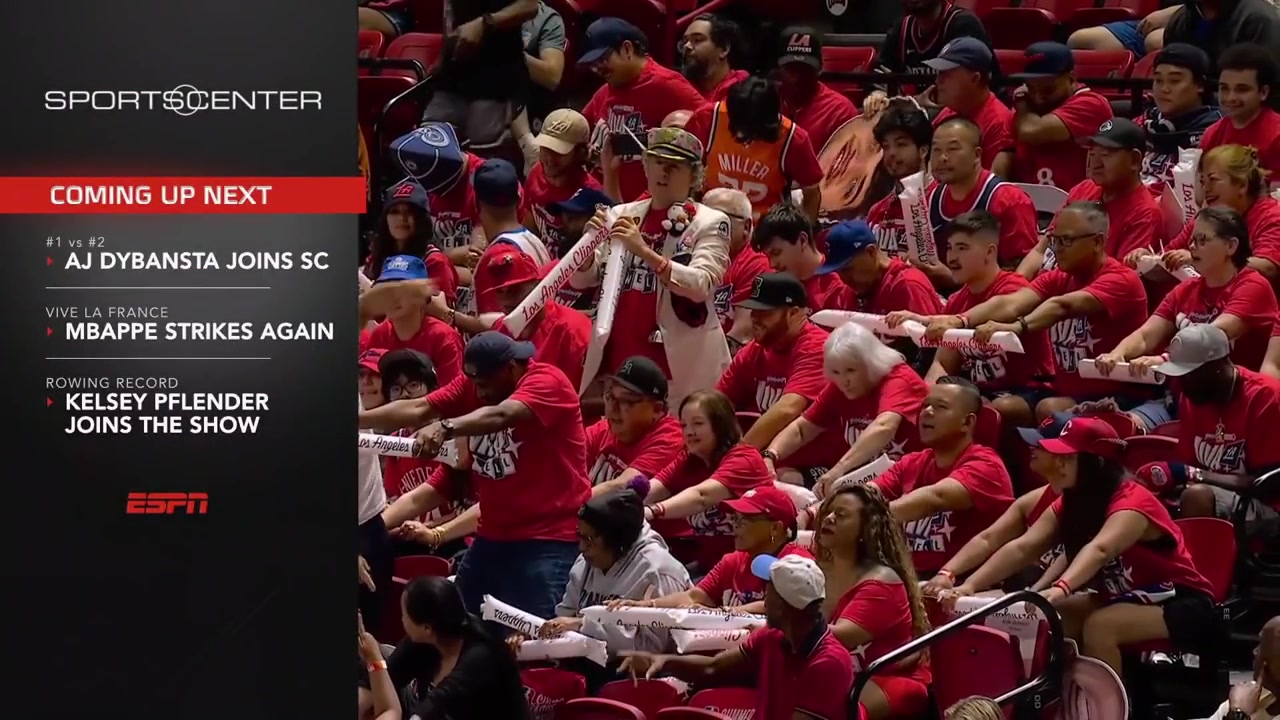 NBA fans doing together the row motion in the crowd just like the Norwegian fans do in the current World Cup soccer