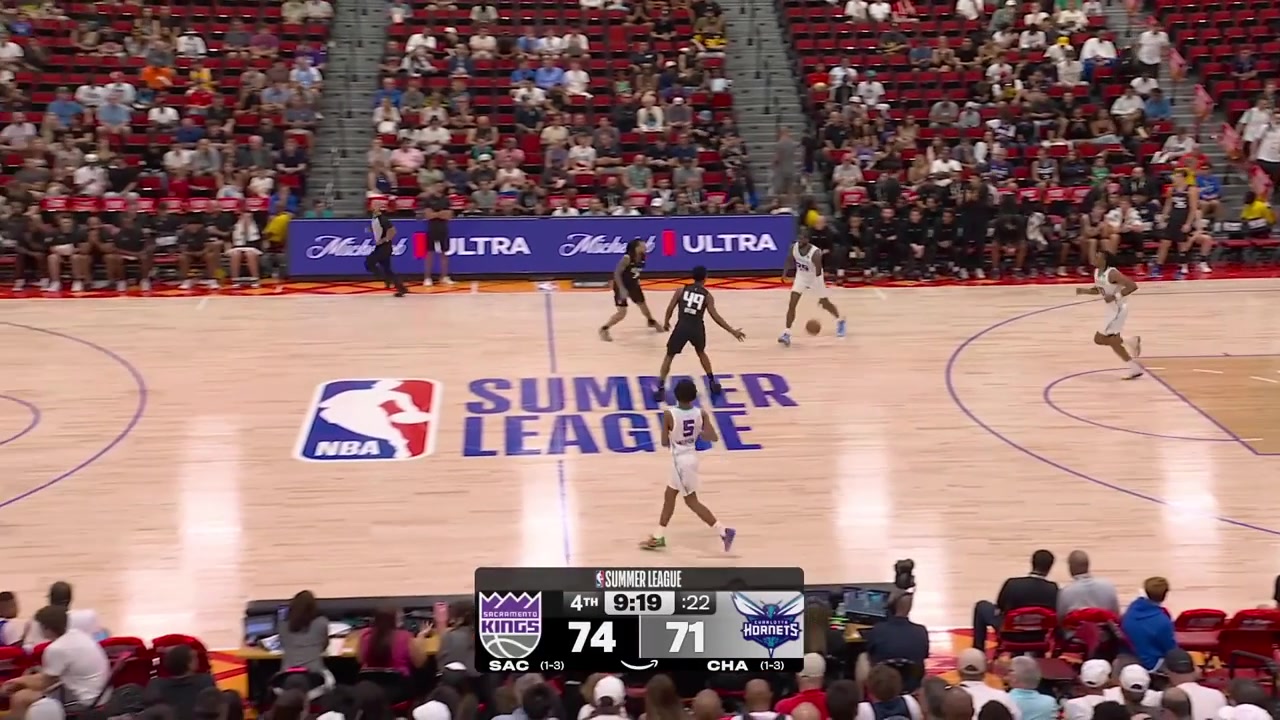Emanuel Sharp hustles on defense to stop the pass inside and somehow deflects the ball to his own basket with replays