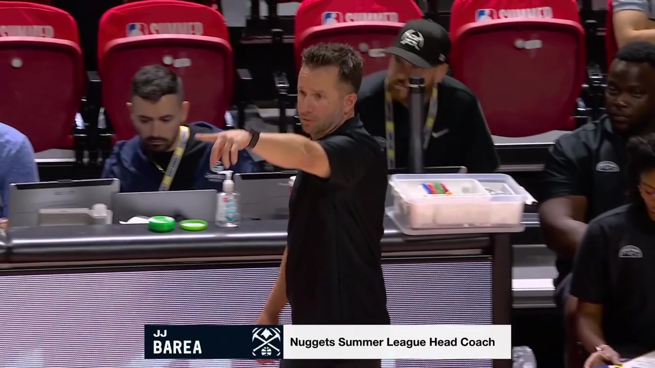 JJ Barea the Summer League head coach for the Nuggets and the announcer seems to like his shoes
