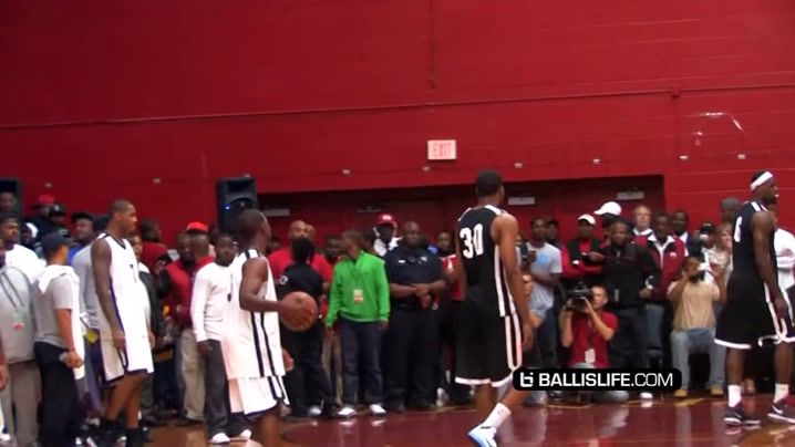LeBron James and Dwayne Wade give Chris Paul a boost for a dunk 2011