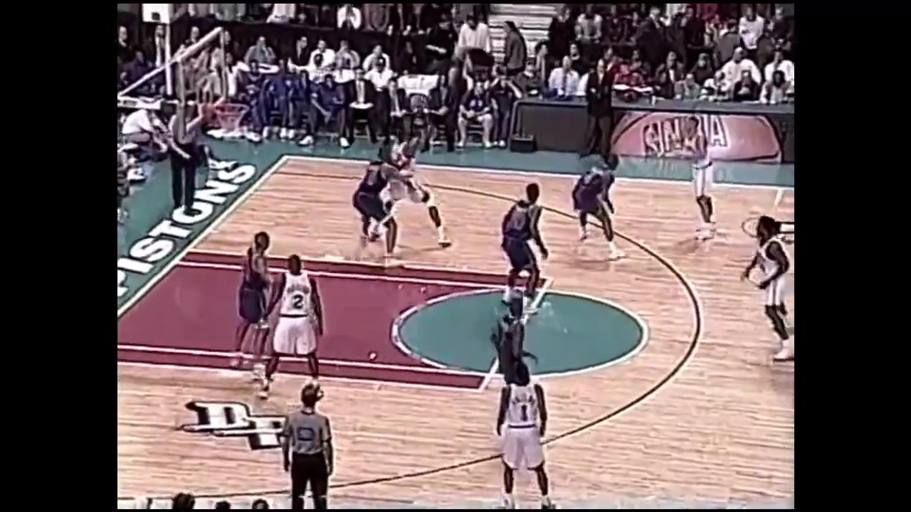 38-year-old Rick Mahorn keeps pulling the chair on Patrick EwingDecember 18th 1996