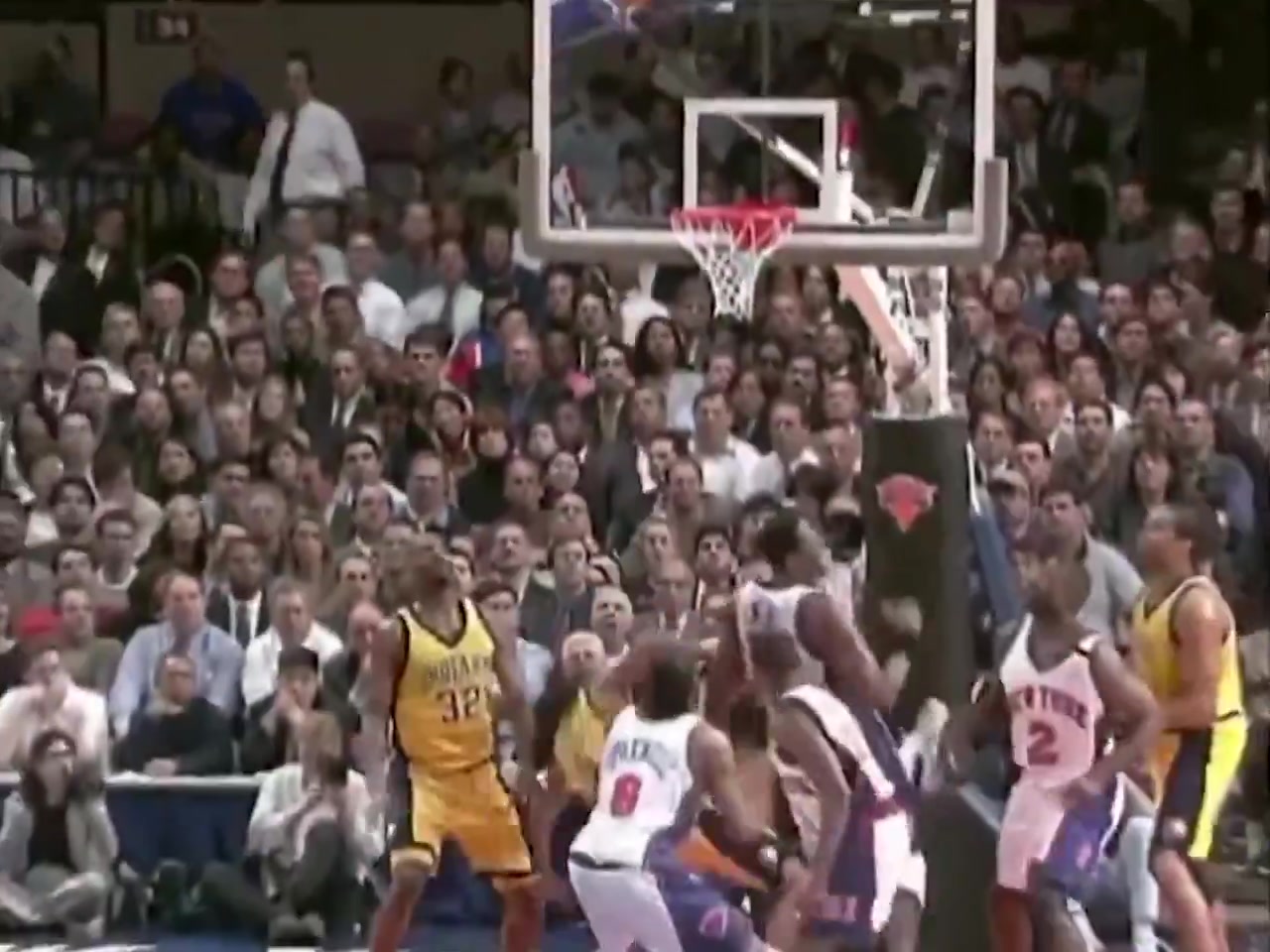 Jalen Rose trips Patrick Ewing and Big Pat starts walking him down like a 7-foot Terminator Dale Davis pulls up the whole Garden panics Vivica Fox is courtside yelling and somehow Jeff Van Gundy is in the middle of a fight he has no business surviving