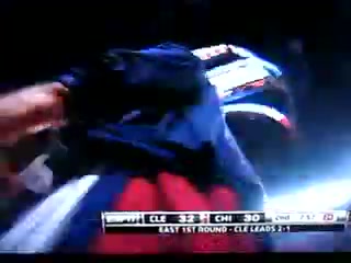 A ballboy waits to collect Lebron's warmups but Lebron insists on throwing them to the ground