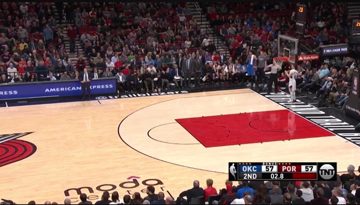 Taj Gibson with an incredible one handed 60 foot buzzer beater