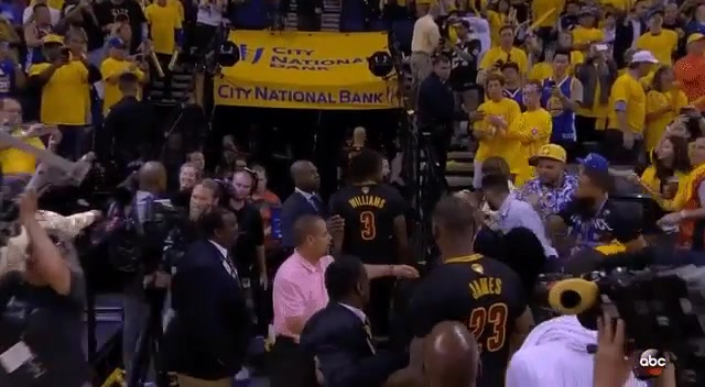 Fight breaks out in the crowd as Lebron is leaving the floor