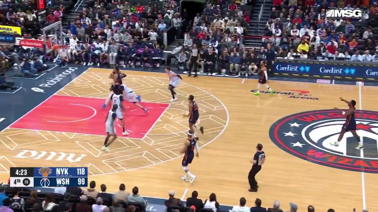 KAT with the huge dunk over Alex Sarr