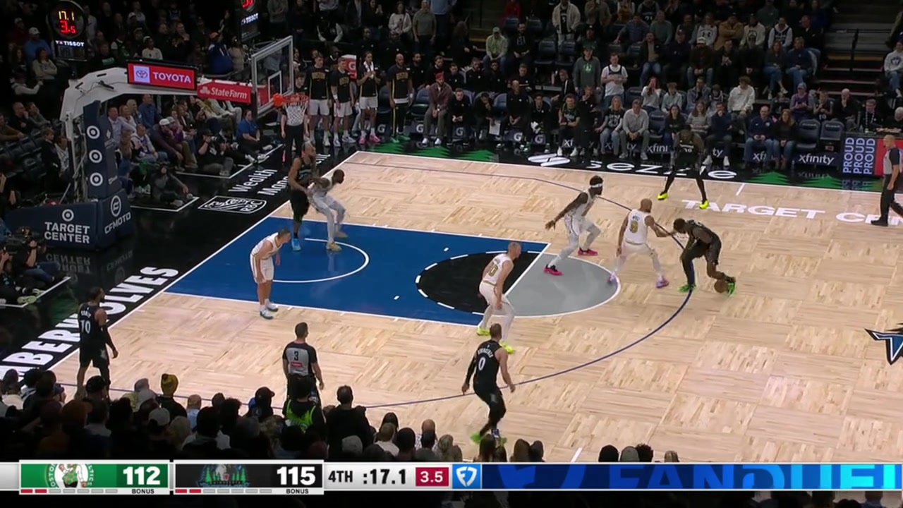 Anthony Edwards loses the ball regains it and hoists up a three-pointer that hits nothing but net with 15 seconds left with replay