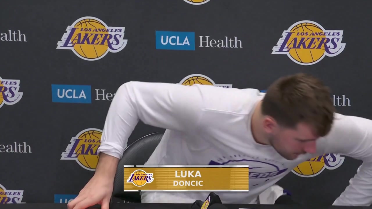 Luka Doncic drops his phone and a reporter says turnover