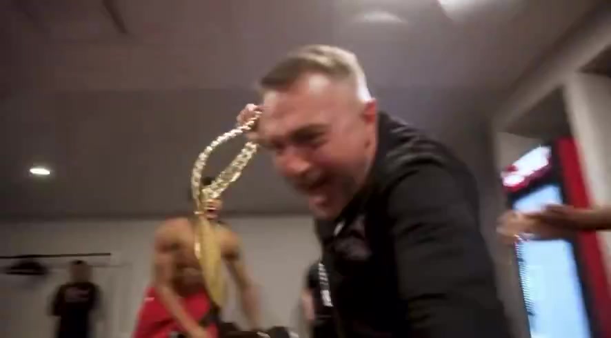 Scottie viciously attacks his head coach as the team celebrates the win in the locker room
