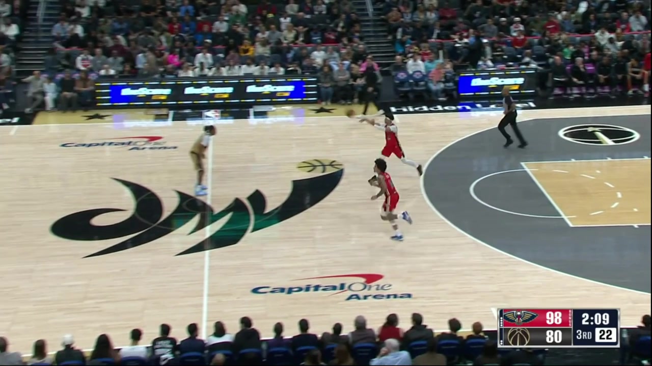 Jeremiah Fears heaves a lob from his own three point line Trey Murphy throws it down