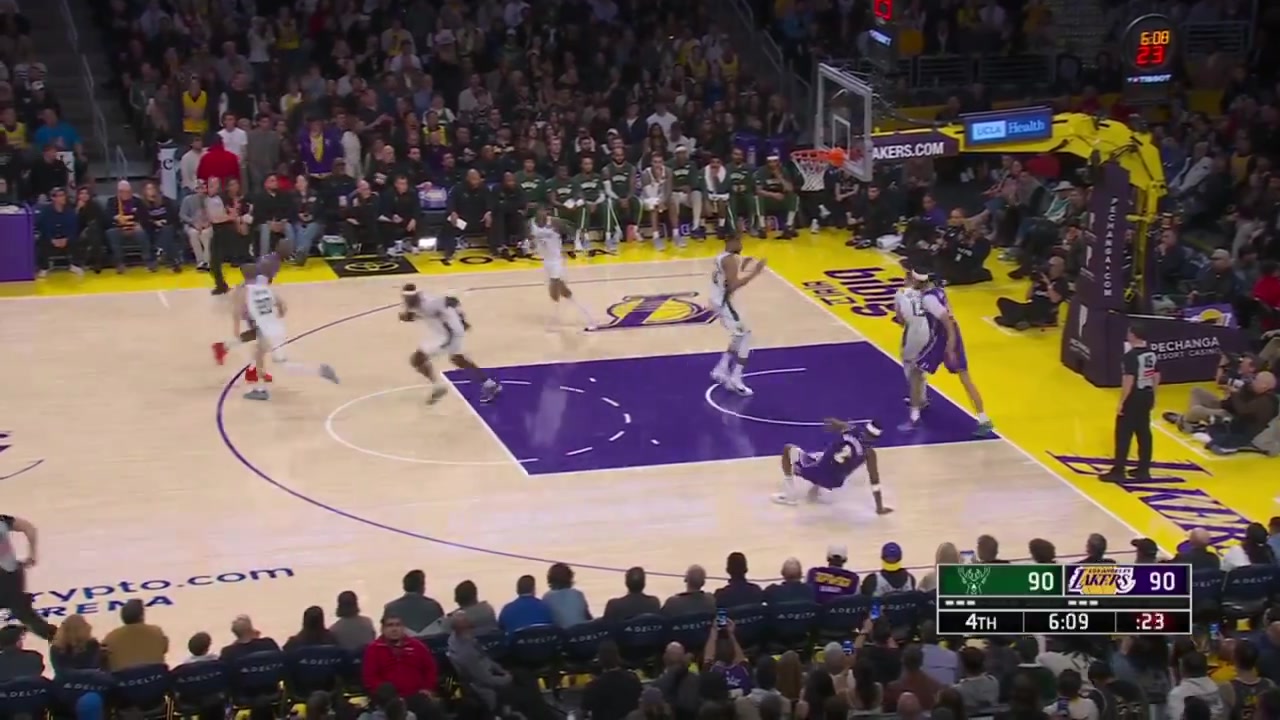 Lebron James steals the inbound pass from Giannis Antetokounmpo and scores