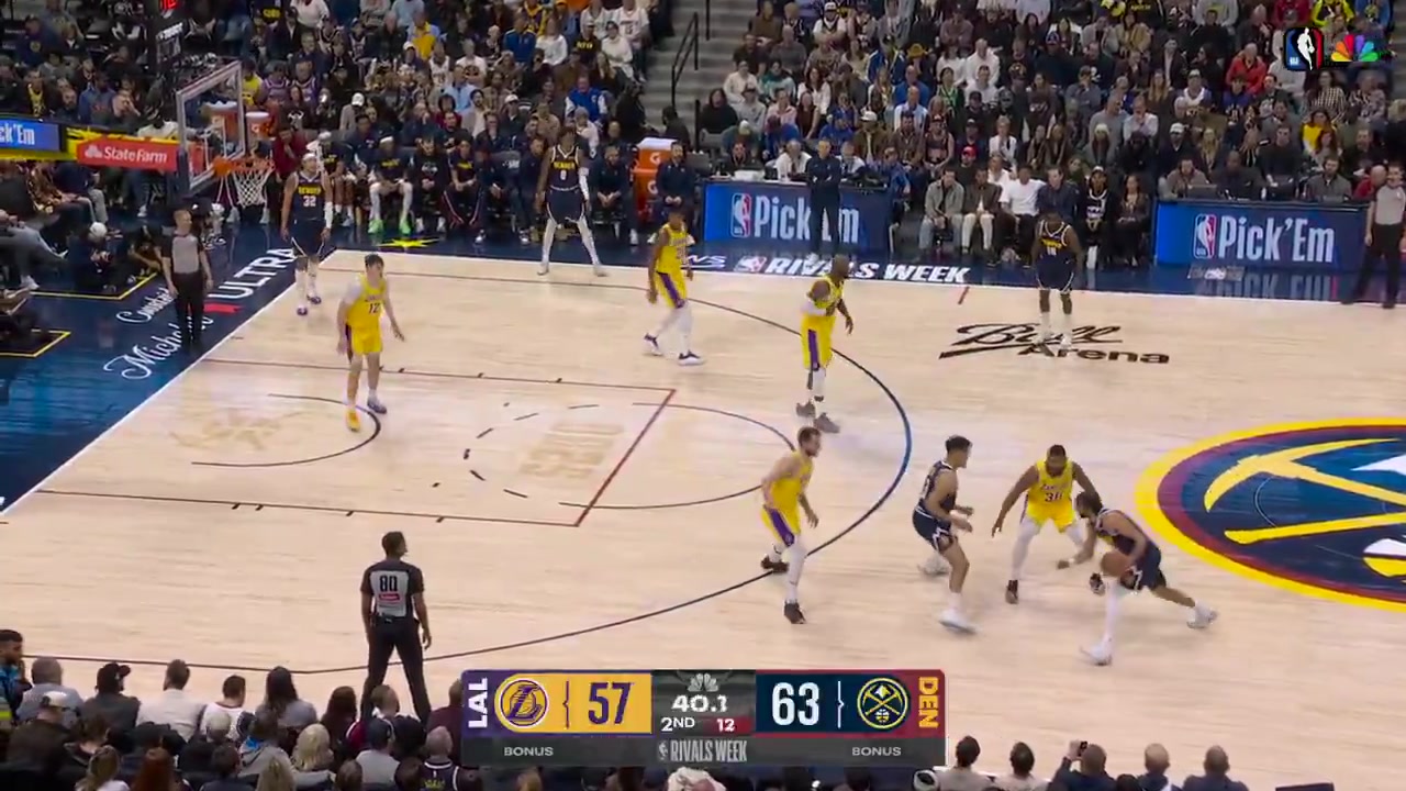 Jamal Murray with a one-handed alley-oop pass to Aaron Gordon for the reverse dunk