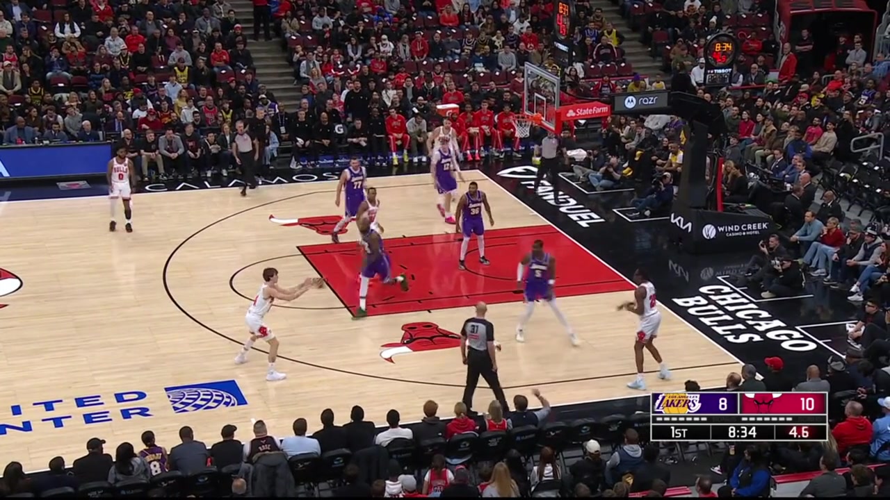The local crowd in Chicago gets really loud as LeBron James finishes the fastbreak dunk