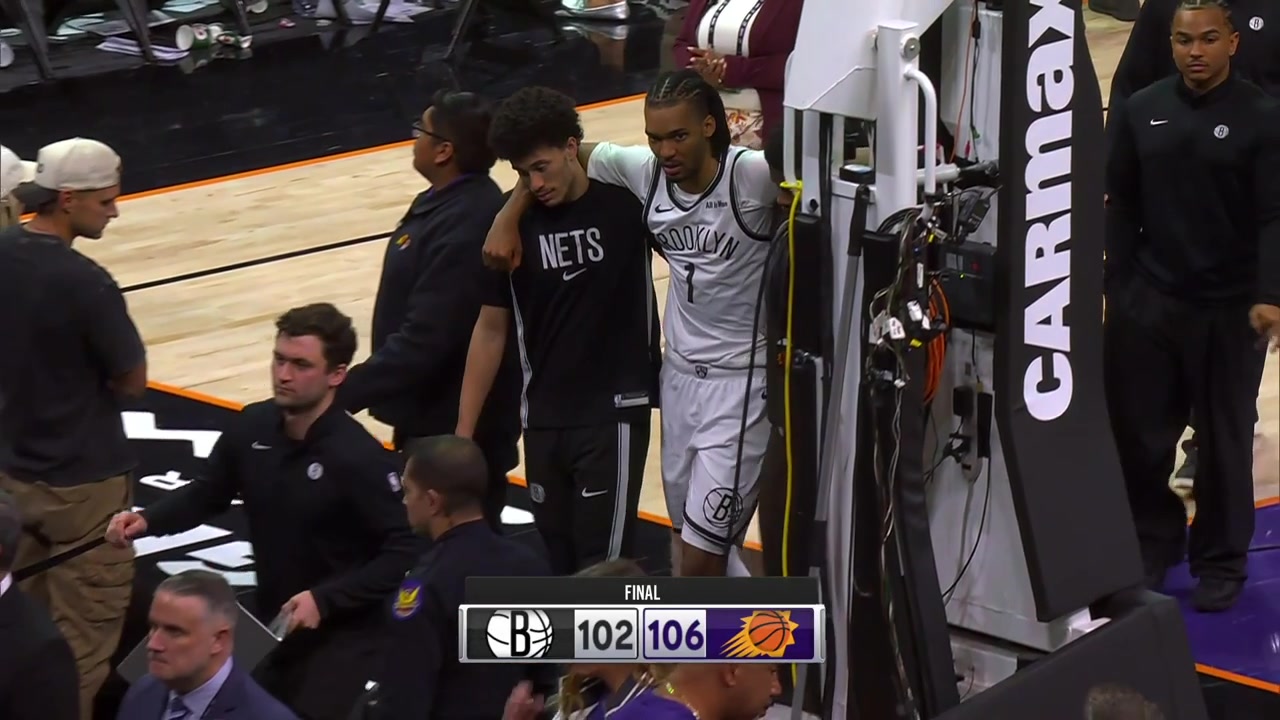 Injury Ziaire Williams is helped to the locker room by his teammates at the end of the game after he got hurt in the scuffle a minute prior