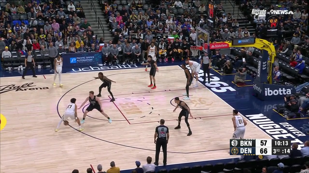 Jamal Murray hits the step-back mid-range jumper over Danny Wolf