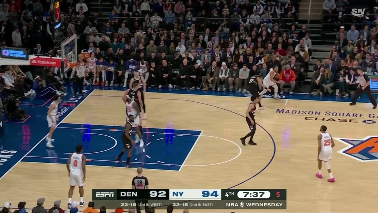 Jalen Brunson swishes the step-back mid-range jumper over Jamal Murray as the shot clock expires