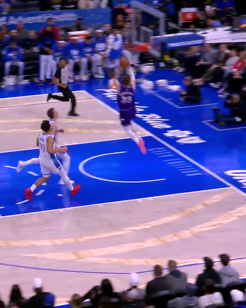 A deeper lob by Isaiah Collier to Lauri Markkanen this time from beyond half court