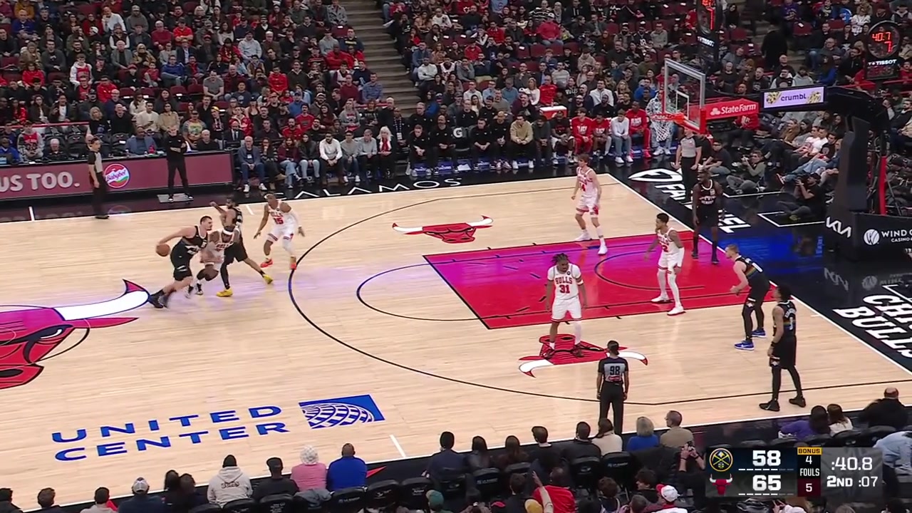 Guerschon Yabusele grabs Nikola Jokic's arm during Jokic's shot attempt but the refs missed it with a replay