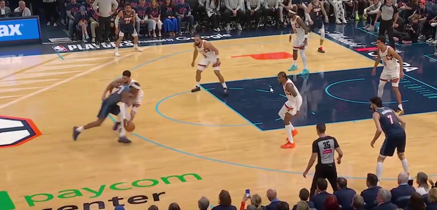 Devin Booker grabs the shirt of Shai Gilgeous-Alexander who manages to draw the collapse and find Chet for three despite the excessive contact