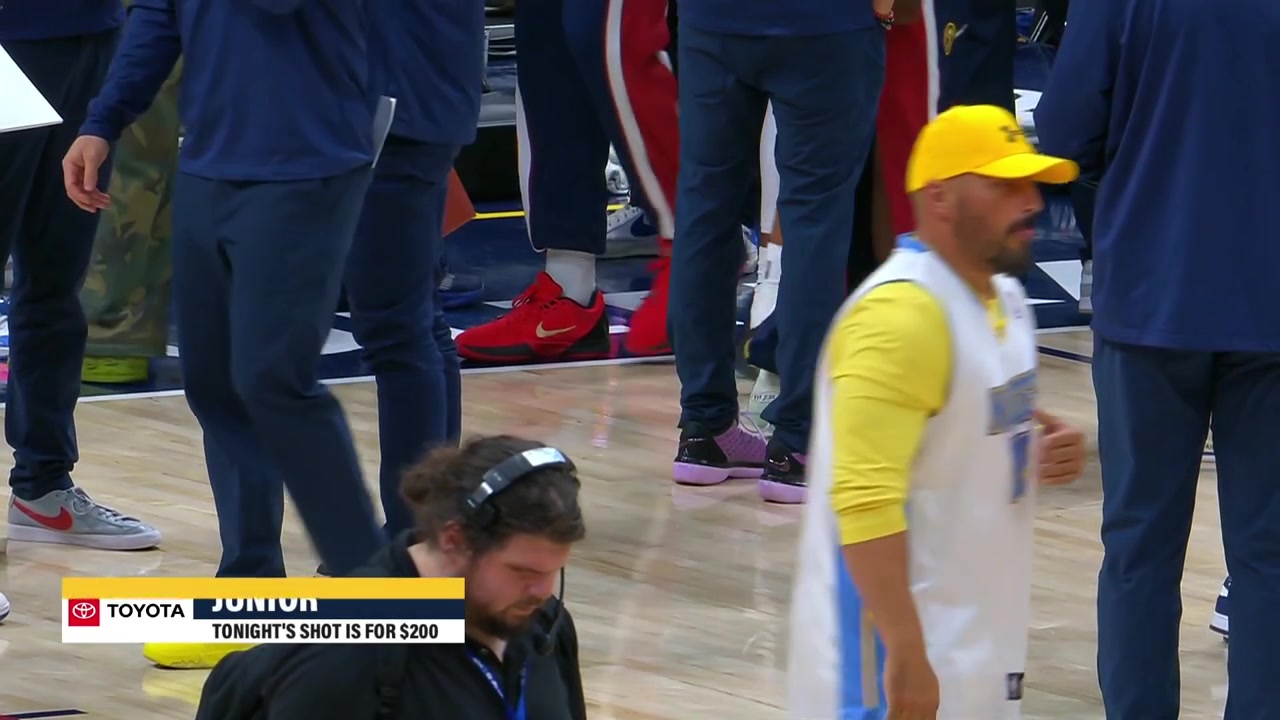 Rocky the mascot hits the no look halfcourt shot with a replayHe also runs in a circle around Ayo Dosunmu
