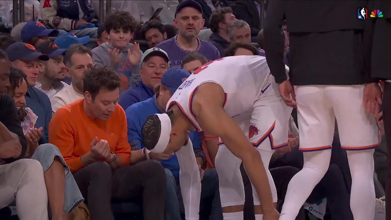 Josh Hart unties Jimmy Fallon's shoe laces