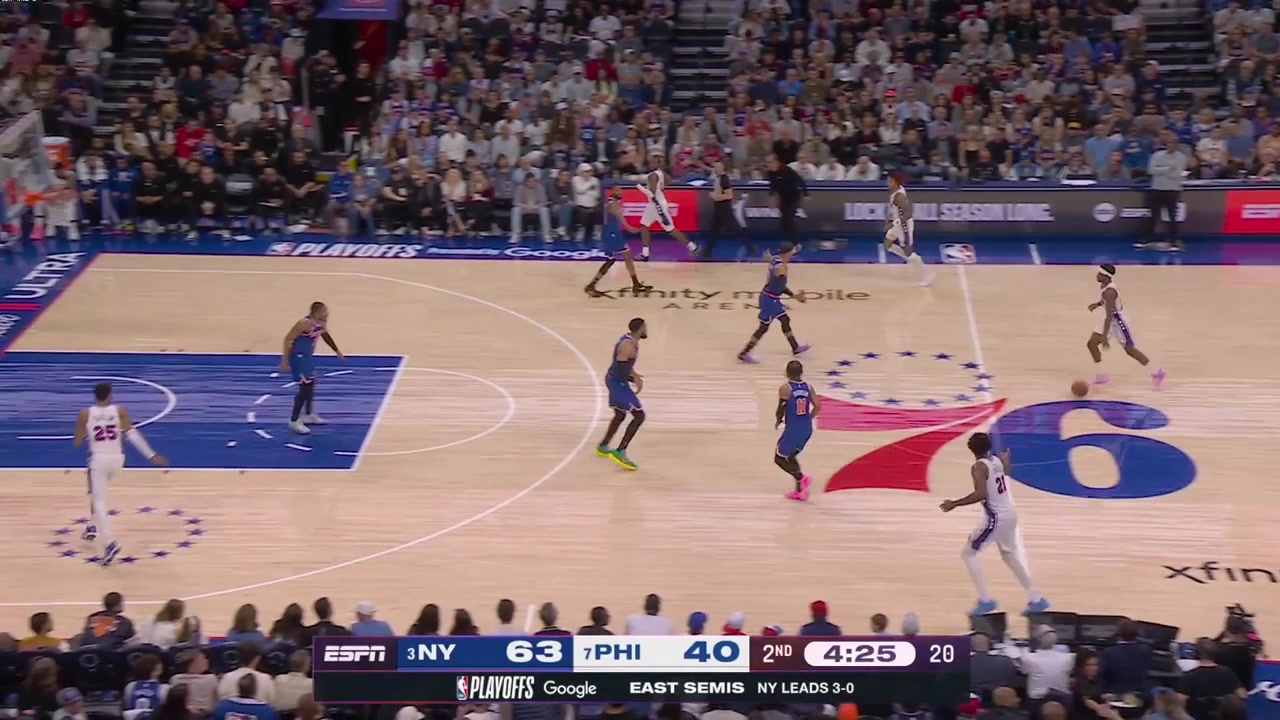 Joel Embiid scores the And-1 tip in and receives REALLY loud boos from the Knicks fans in Philly