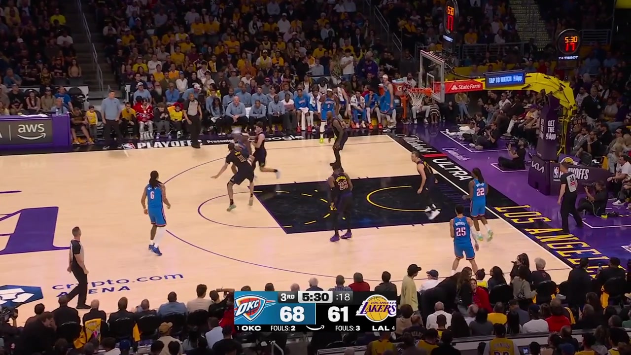 Lowlight Austin Reaves with a laser pass to an unamused Lakers' fan in the first row causing a spill with replays