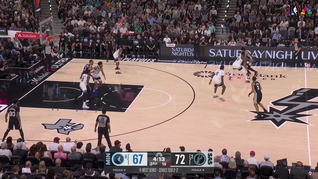 Wembanyama gets boxed behind the backboard but still manages to reach for the rebound and finish the and-one putback