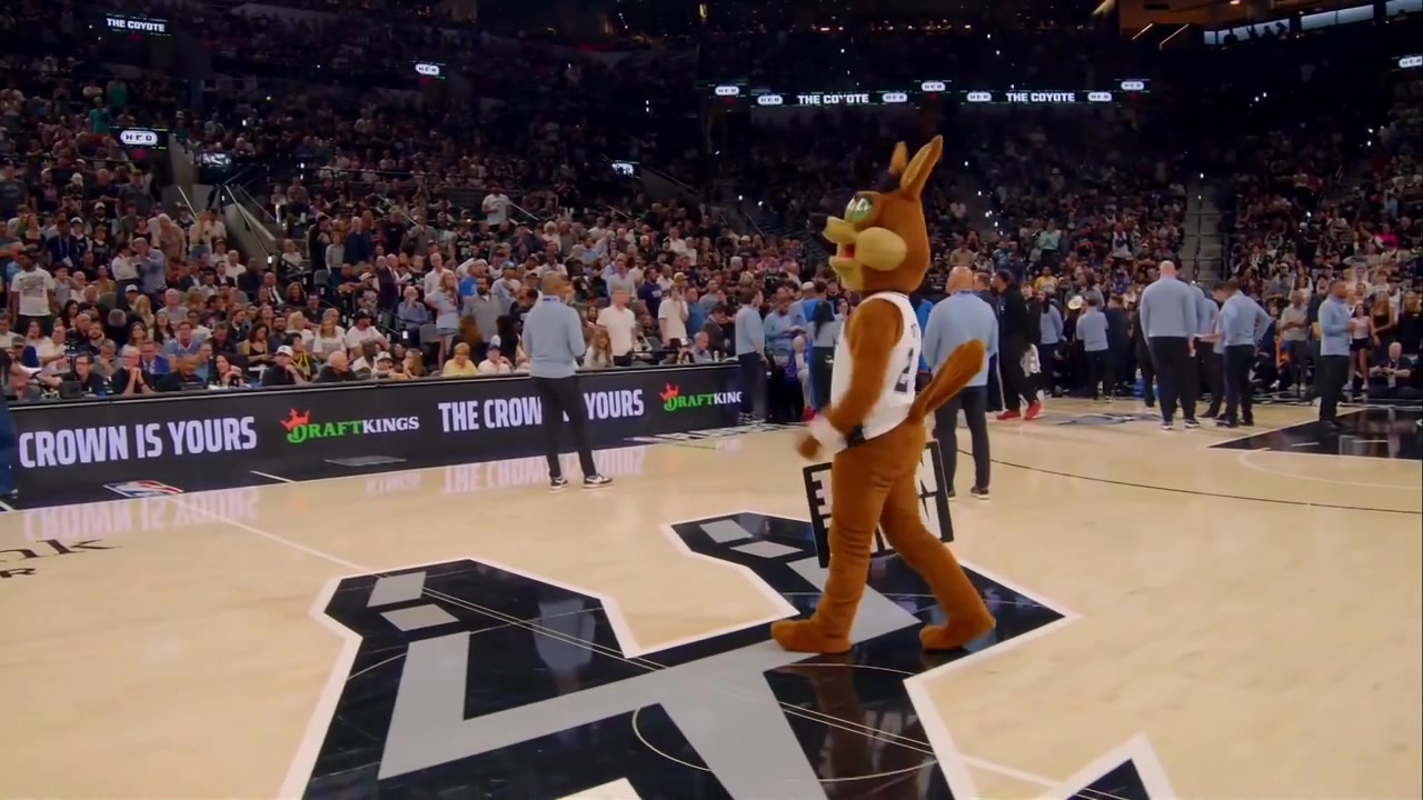 The Spurs bring an imitation of Rumble the Bison Thunder's mascot to bully the Spurs' mascot Coyote and then WWE HOF Mark Henry comes to take care of him