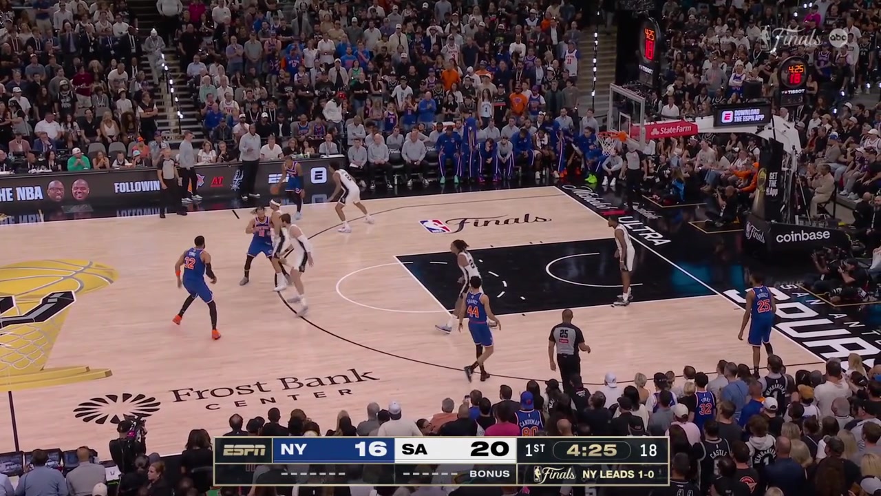 Karl-Anthony Towns goes around Luke Kornet for the layup