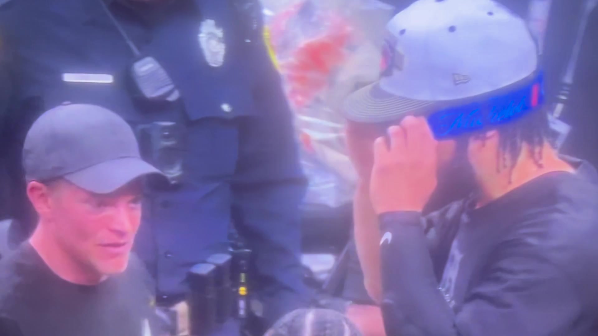 Cop harrassing Jalen Brunson during the celebration
