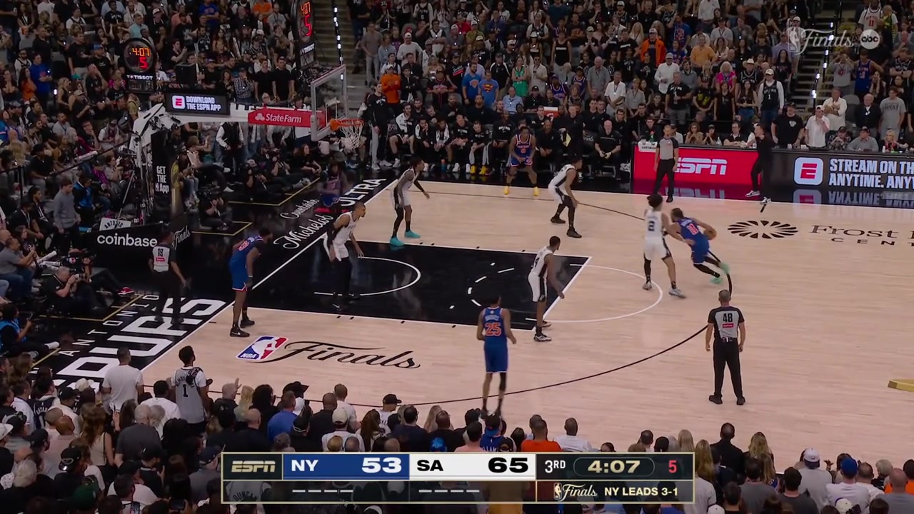 Victor Wembanyama receives a powerful inadvert elbow from Mitchell Robinson while fighting for the rebound as he falls on the floor with blood in his mouth can be seen after the replay