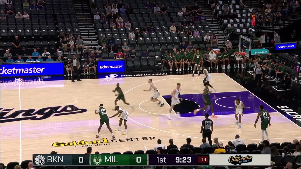 Zach Austin with the two-handed dunk over Duke Brennan with replays