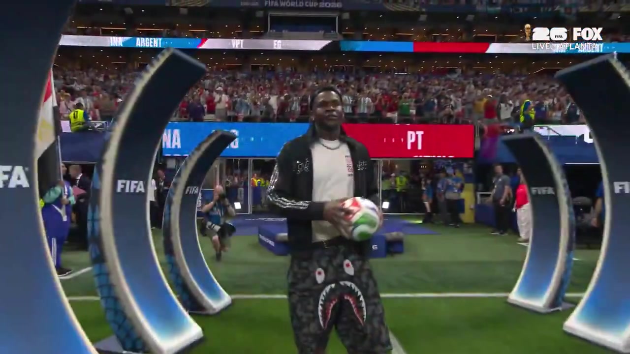 Anthony Edwards presents the match ball at the World Cup for Argentina vs Egypt
