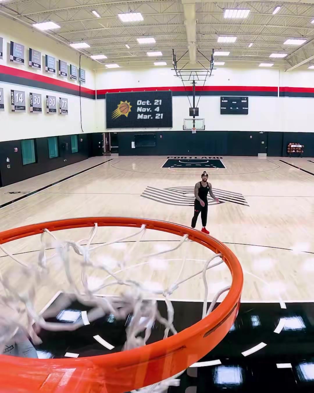 Damian Lillard hits 3s in practice as the Portland Trail Blazers' 2026-27 schedule is revealed in the background