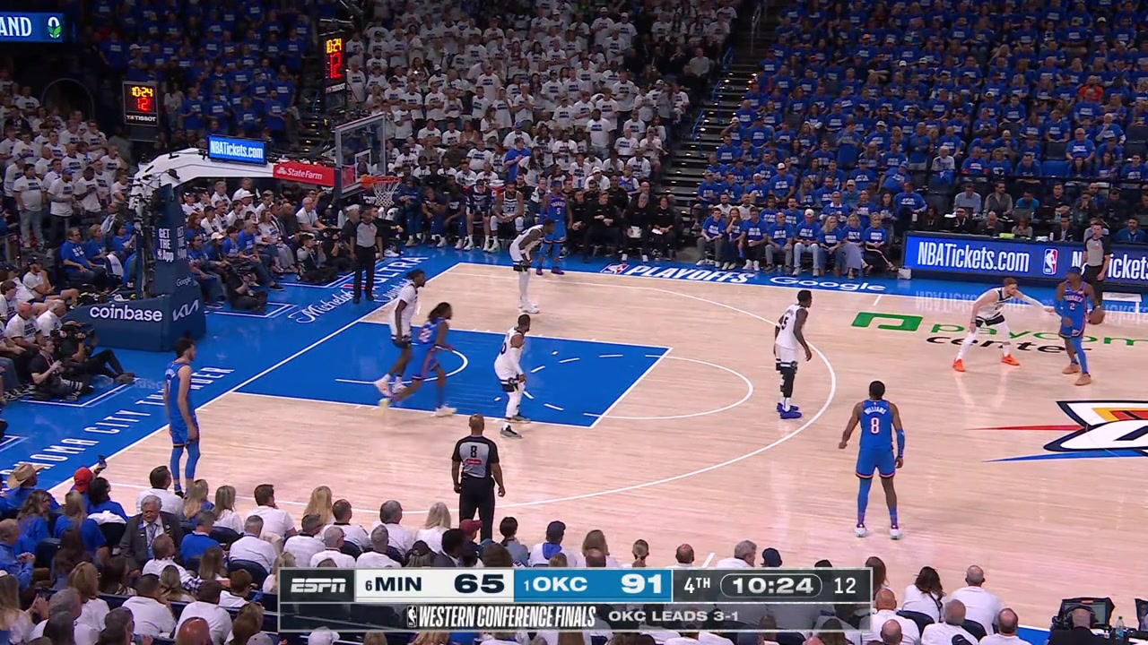 Chet Holmgren grabs the rebound with his right hand and finishes it under the rim with one continuous motion