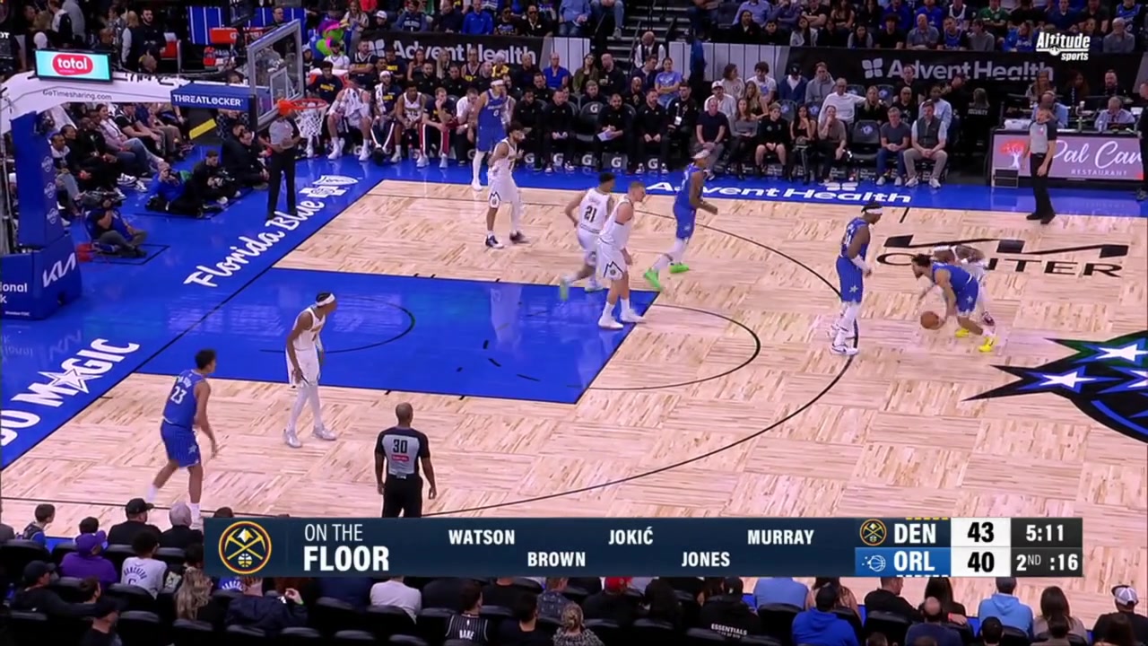 Nikola Joki is called for a foul on defense and argues that he hit the ball before making contact with the attacker
