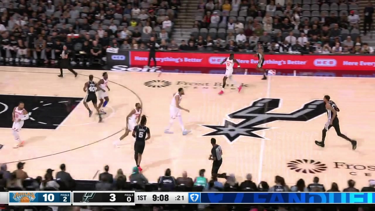 Victor Wembanyama with the crossover and drive on Karl-Anthony Towns who is called for the foul with a replay